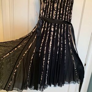 Flirty Xscape sleeveless black and tan, never worn, dress.
